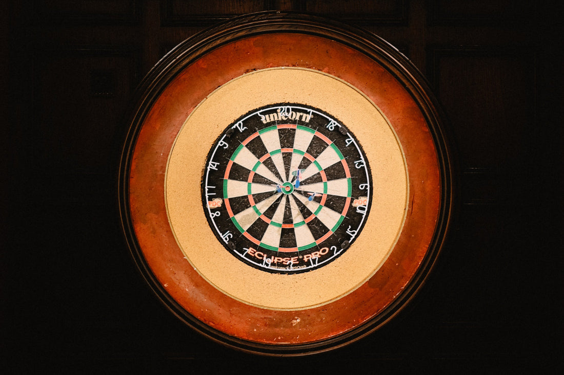 The Intriguing Design of Dart Board Numbering: Origins and Rationale