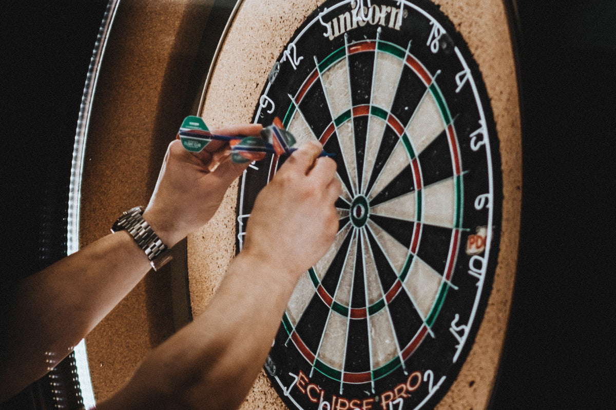 Unraveling the Secret: How Darts Players Add Up Scores Quickly