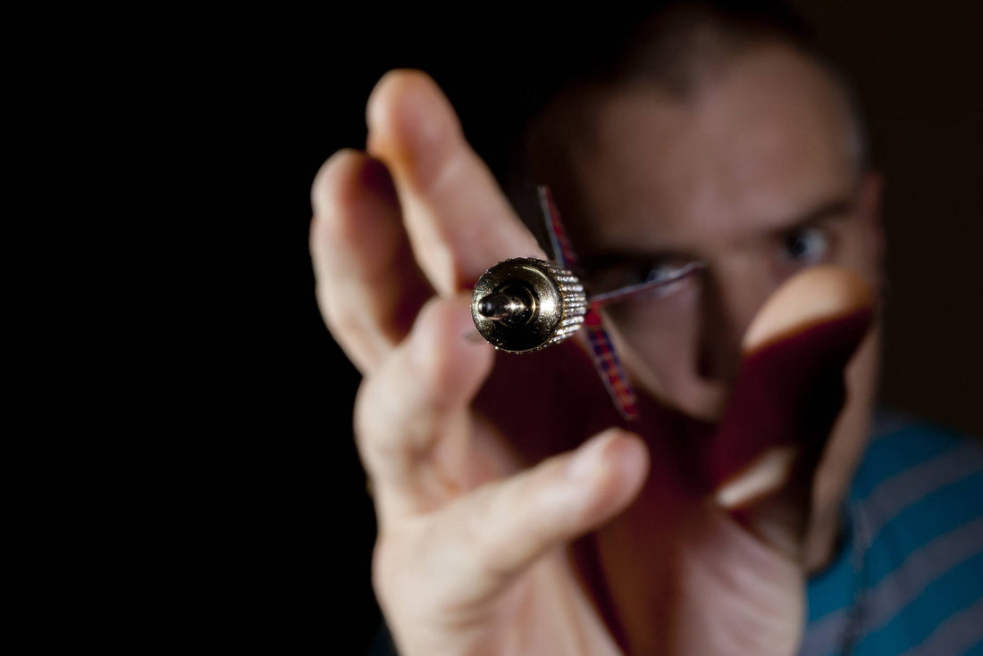 Perfecting Your Aim: How Fast Should You Throw Darts?